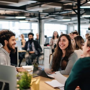 an open wideshot of an office workplace seeings lots of people being kind to each other